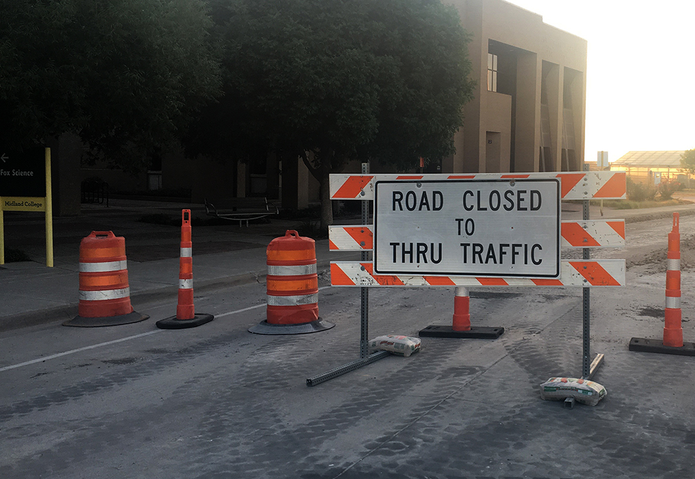 Road Closed Sign in front of building