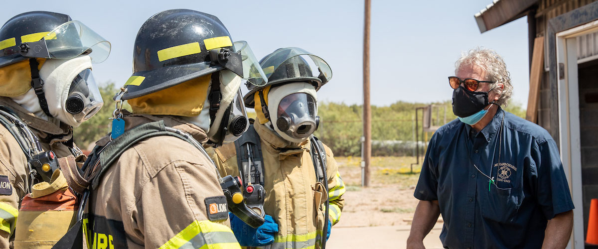 Instructor with firefighting students