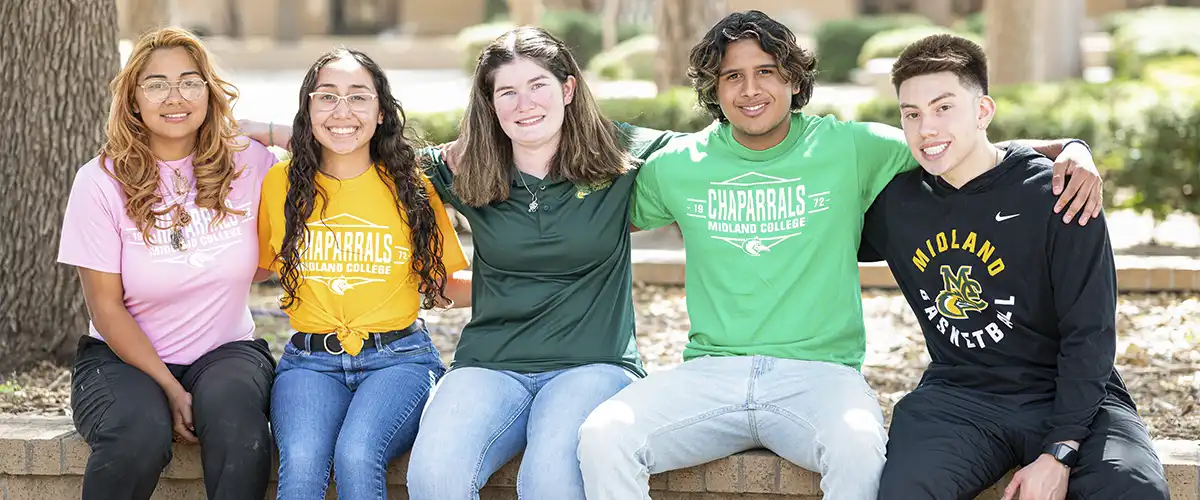 Midland College students sitting at Beal Plaza