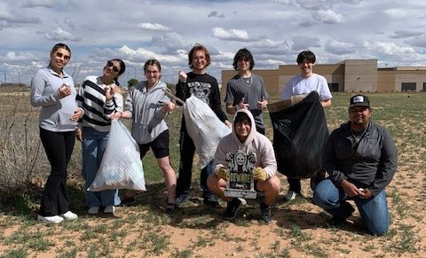 Ambassadors working campus clean up