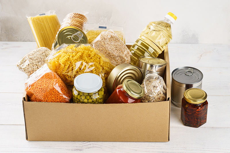 The image to use for this article. Listing image managed through RSS tab. Cans of food in a box.