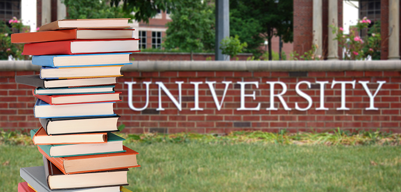 The image to use for this article. Listing image managed through RSS tab. University sign with books