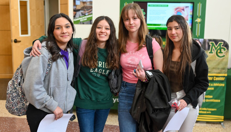 sFour Midland College students pose at the Chaps Connect event.