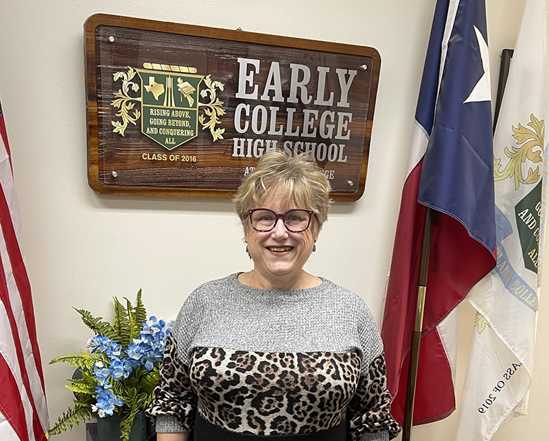 sECHS@MC Chancellor Renee Aldrin standing in front of ECHS@MC crest