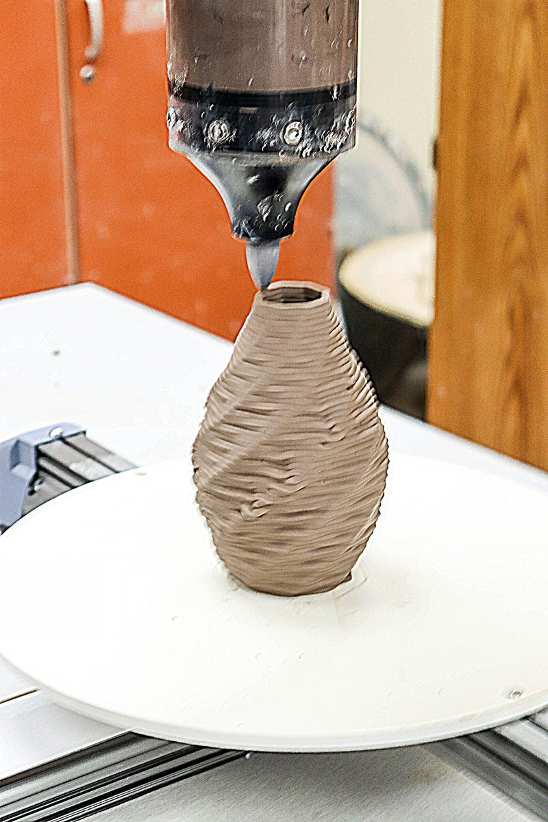 The image to use for this article. Listing image managed through RSS tab. Robotic potter etches vase