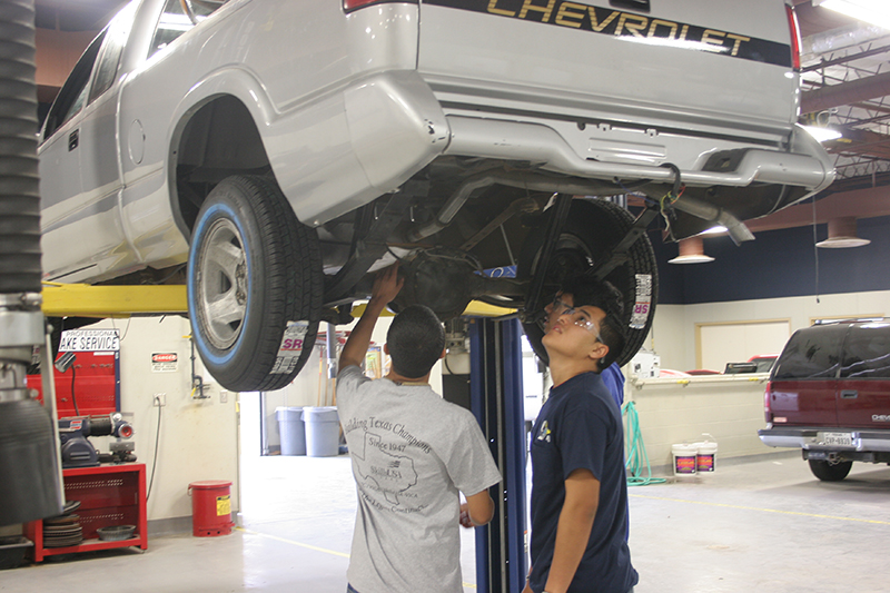 The image to use for this article. Listing image managed through RSS tab. Auto Technology students learning about car.