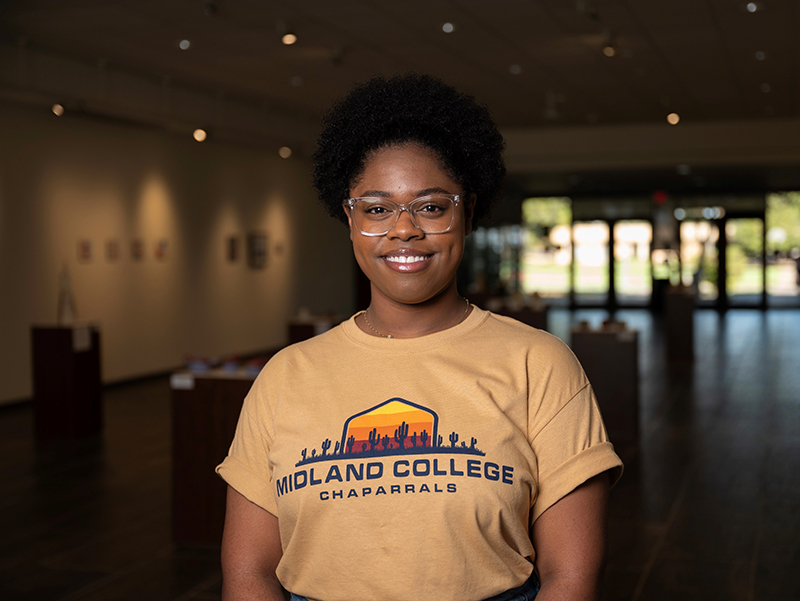 The image to use for this article. Listing image managed through RSS tab. Sara Lydia Carvalho Da Costa standing in the Allison Fine Arts Building.