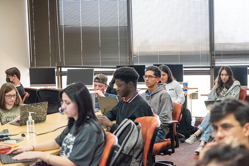 The image to use for this article. Listing image managed through RSS tab. Various students sitting in class at table and computers.