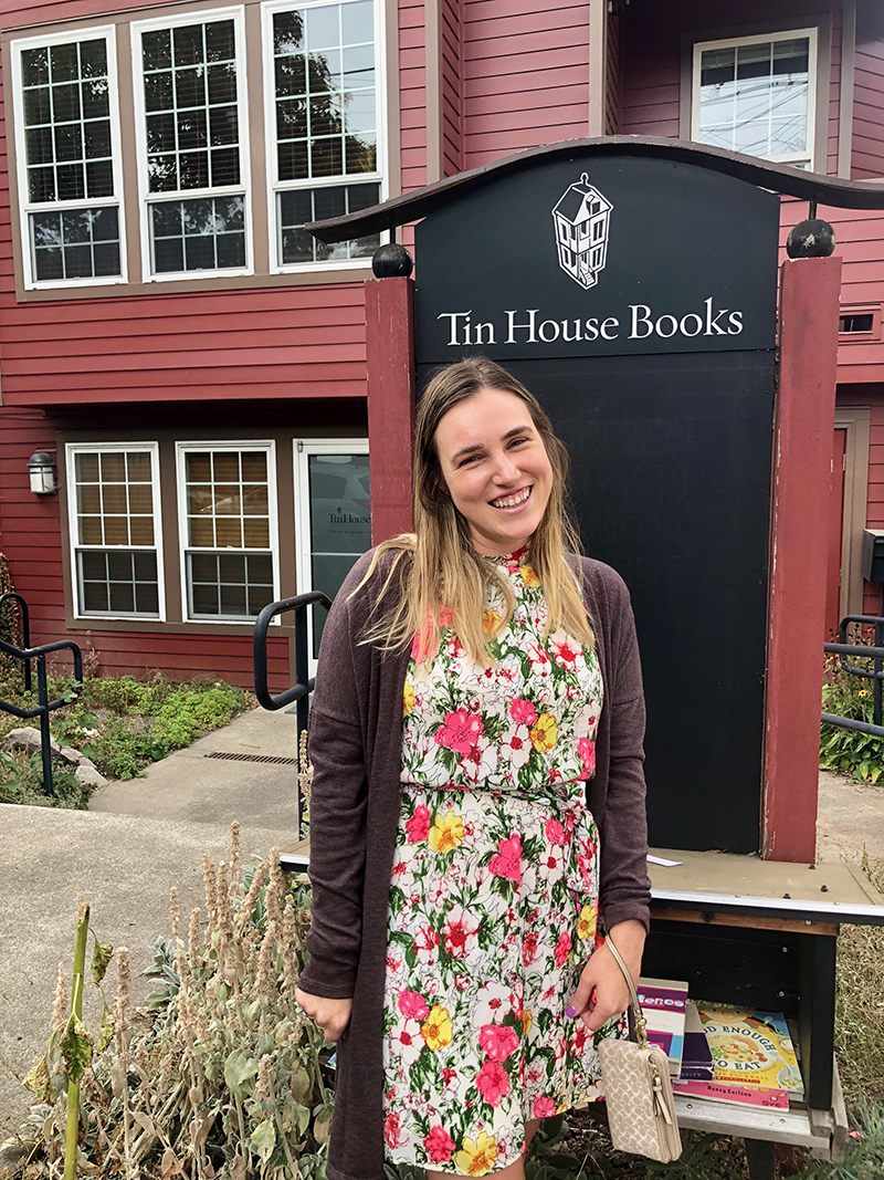 The image to use for this article. Listing image managed through RSS tab. Stacy Egan in front of Tin Books sign