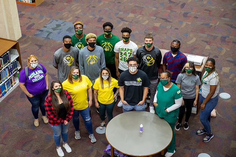 The image to use for this article. Listing image managed through RSS tab. MC students with face masks in Fasken Learning Resource Center