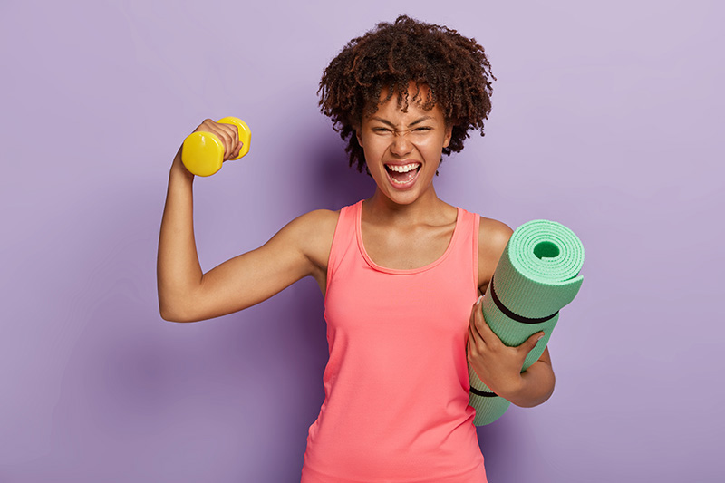 The image to use for this article. Listing image managed through RSS tab. Woman with weights and yoga mat