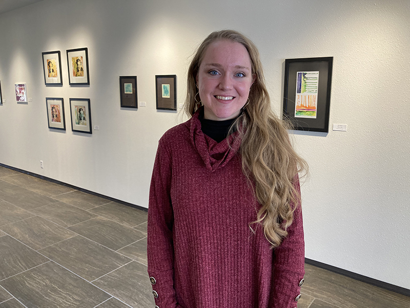 The image to use for this article. Listing image managed through RSS tab. Anna Lien standing in the Allison Fine Arts Building McCormick Gallery.