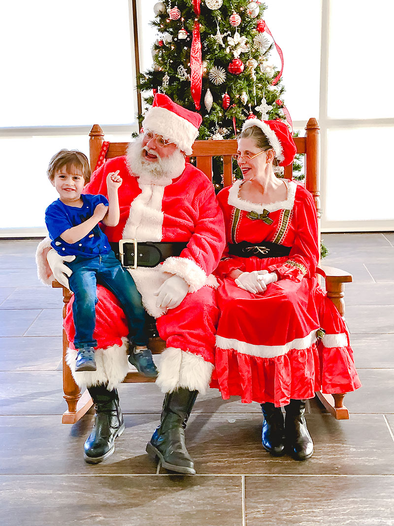 The image to use for this article. Listing image managed through RSS tab. Luke Prementine with Santa and Mrs. Claus