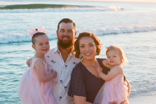 sHaley McNerlin and her family enjoying a family beach vacation.  Pictured from left to right are Stella, Cole, Haley and Savannah.
