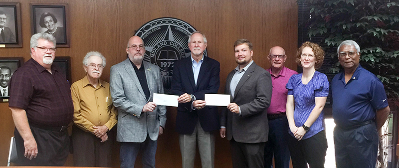 The image to use for this article. Listing image managed through RSS tab. Members of Northside Lions Club present two scholarship checks to MC President Dr. Steve Thomas.