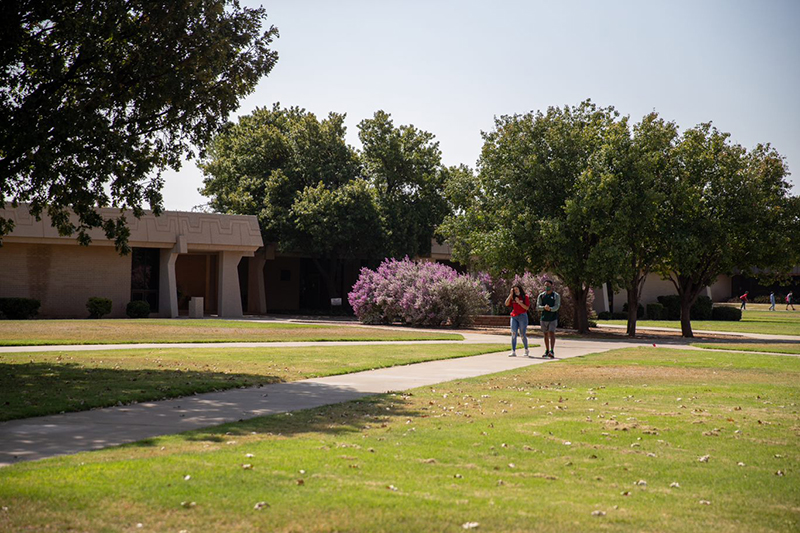 The image to use for this article. Listing image managed through RSS tab. Students walking on MC campus near TC Building.