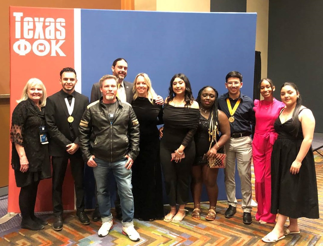 The image to use for this article. Listing image managed through RSS tab. Midland College Phi Theta Kappa students pose together at awards ceremony.