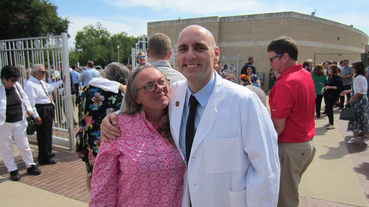 The image to use for this article. Listing image managed through RSS tab. Clarence Sparks with his mother after “White Coat” ceremony, which signifies the beginning of medical school.