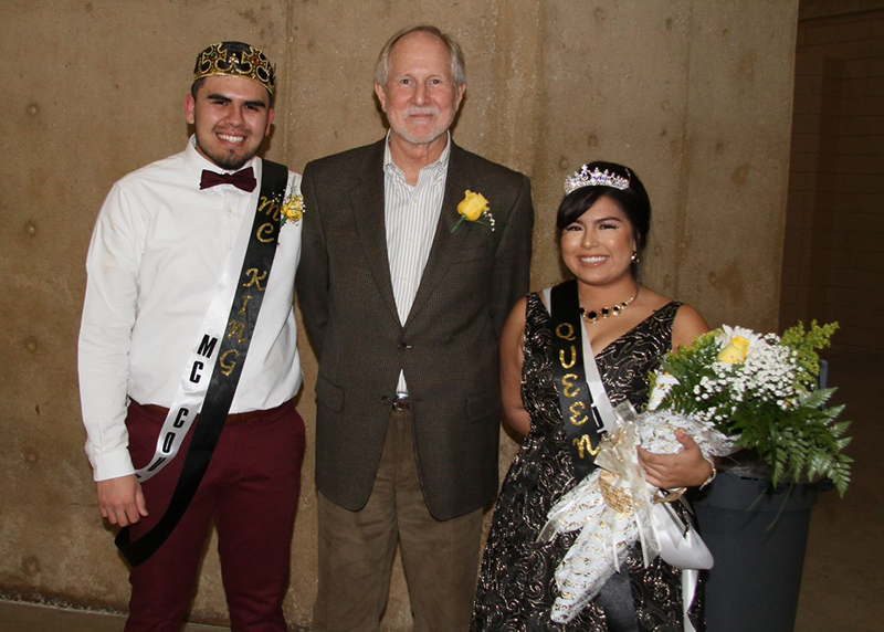 The image to use for this article. Listing image managed through RSS tab. Dr. Steve Thomas (center) with 2017 MC Homecoming King and Queen