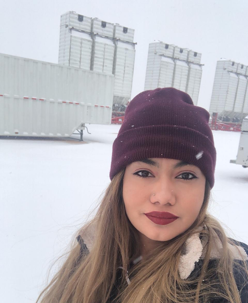 The image to use for this article. Listing image managed through RSS tab. Aimee Villarreal during a recent snowfall at the San Revolution, Inc. Midland yard.
