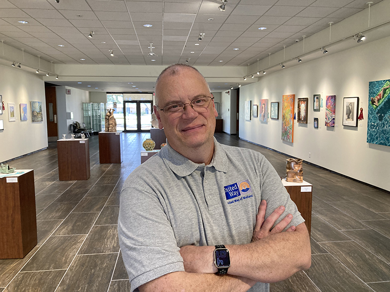 sJ Don Wallace standing in McCormick Gallery in the Allison Fine Arts Building on the main MC campus.