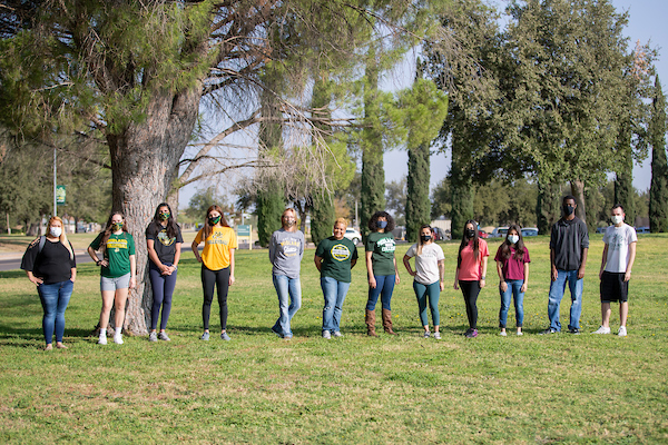 The image to use for this article. Listing image managed through RSS tab. Students on campus wearing masks.