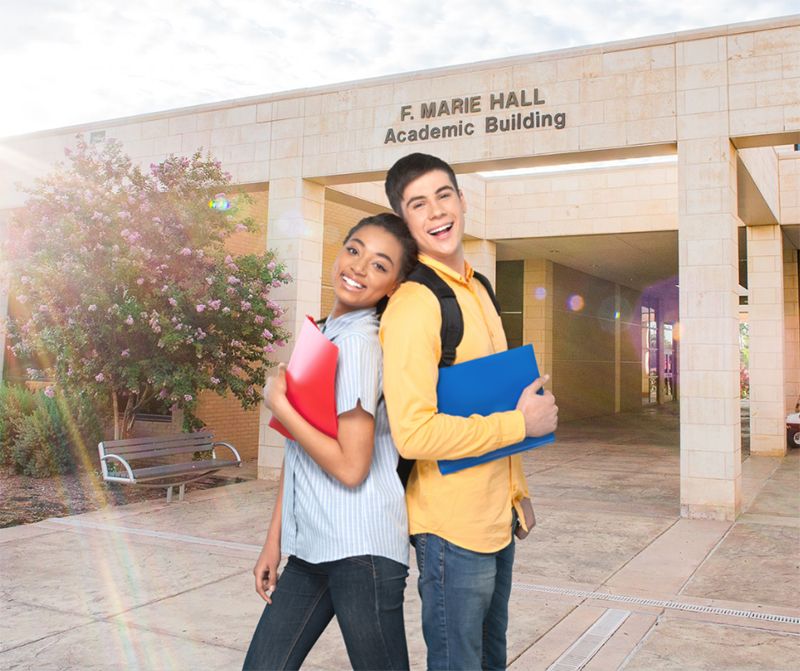 students in front of the F. Marie Hall Academic Building