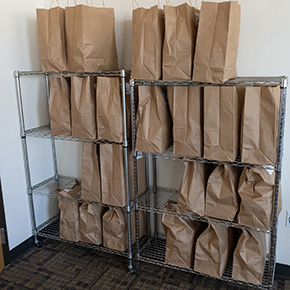 Chap Pantry pickup area shelves of food